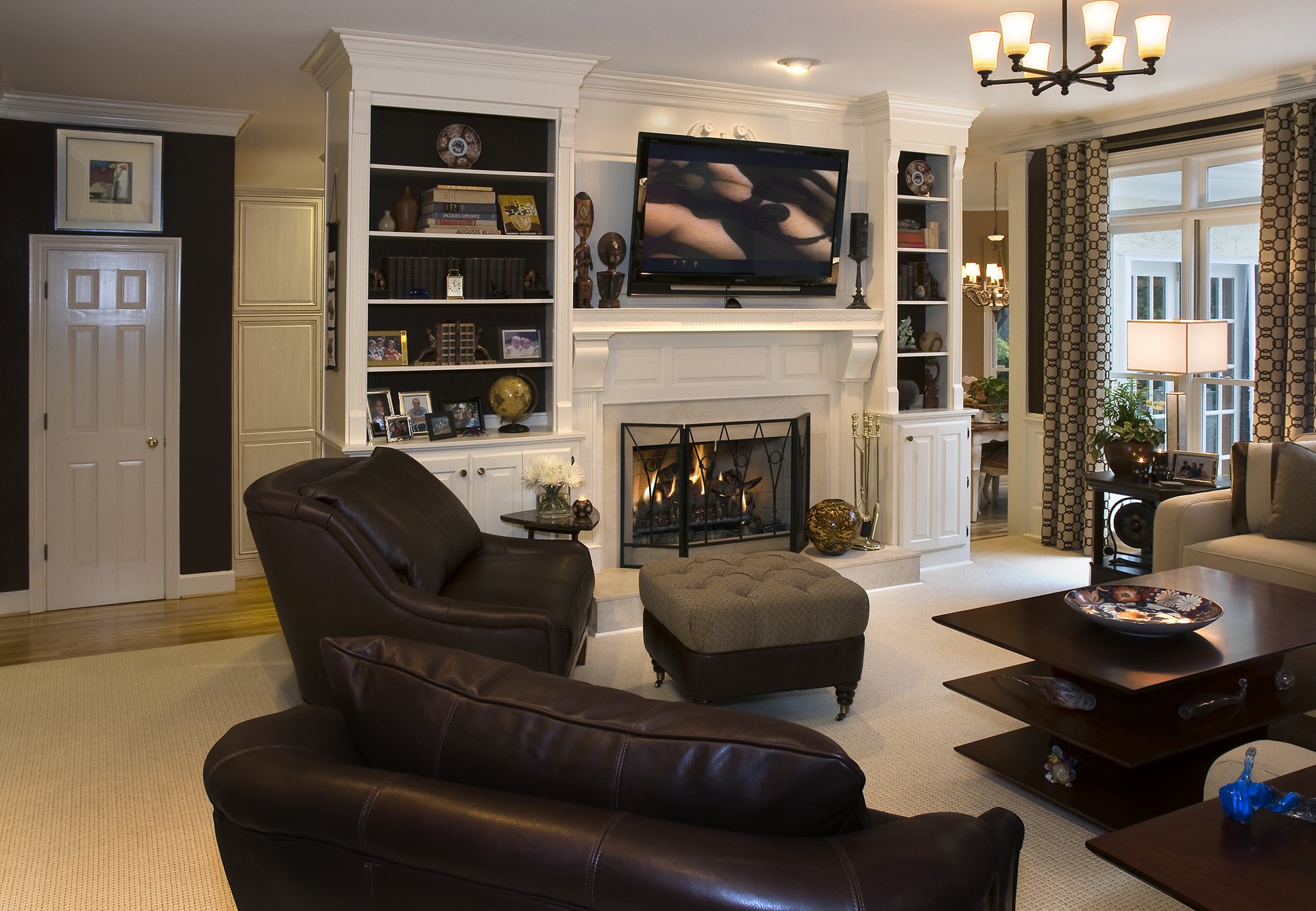 living-room_brown-and-taupe-and-cream_bookcase-with-tv.jpg