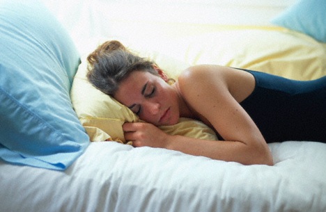 woman-sleeping-on-pillows.jpg