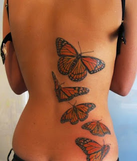 Tattoo+Designs+For++women+butterfly-tattoos-designs-going-up-womens-back.jpg