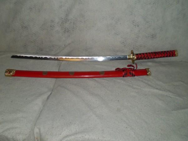 Kenshin__s_Reverse_Blade_Sword_by_grimmjow__jaggerjack.jpg