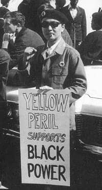 Richard_Aoki_w_sign_Yellow_Peril_Supports_Black_Power_at_1968_BPP_rally1.jpg