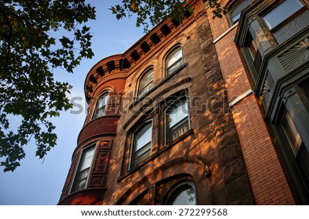 stock-photo-looking-up-at-the-corner-of-a-brownstone-building-272299568.jpg