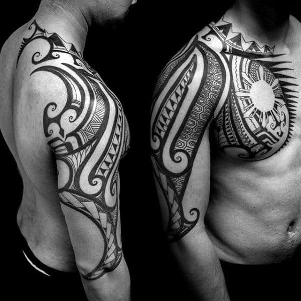 cool-negative-space-sun-mens-arm-chest-and-shoulder-tribal-tattoo-ideas.jpg