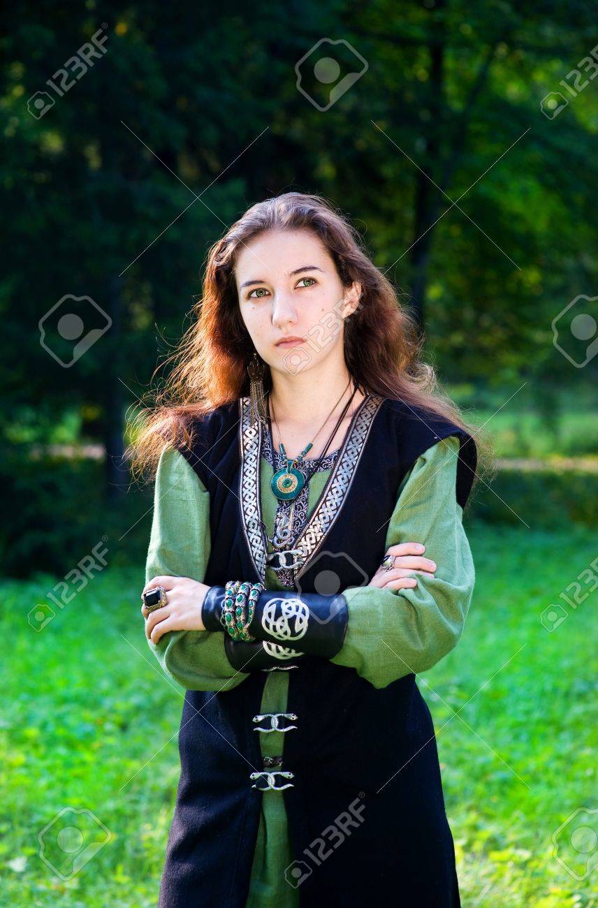 12004908-Young-woman-in-medieval-suit-Stock-Photo.jpg