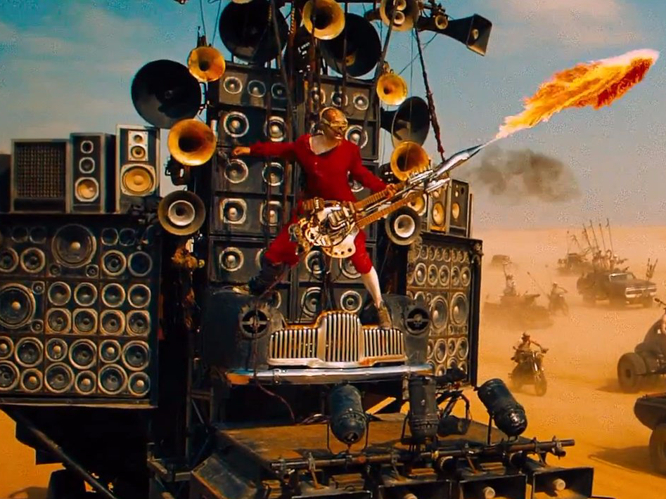 the-man-behind-the-awesome-flamethrower-guitar-player-in-mad-max-fury-road-is-a-popular-australian-musician.jpg