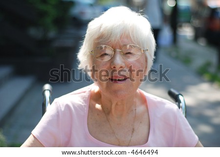 stock-photo-grandmother-on-wheelchair-close-up-4646494.jpg