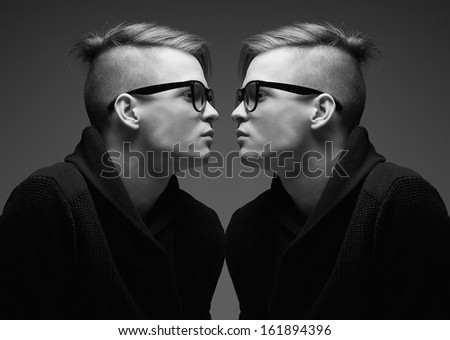 stock-photo-male-beauty-concept-portrait-of-fashionable-young-twins-with-stylish-haircut-wearing-trendy-161894396.jpg