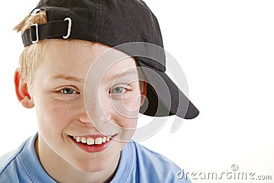 happy-smiling-12-year-old-boy-cap-isolated-12965723.jpg