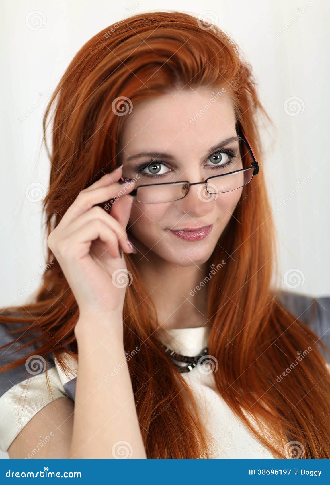 young-red-hair-woman-glasses-38696197.jpg