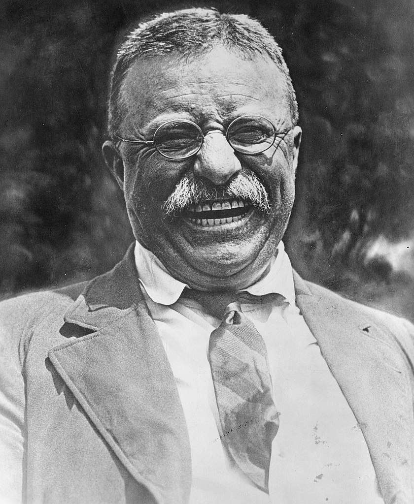 840px-Theodore_Roosevelt_laughing.jpg